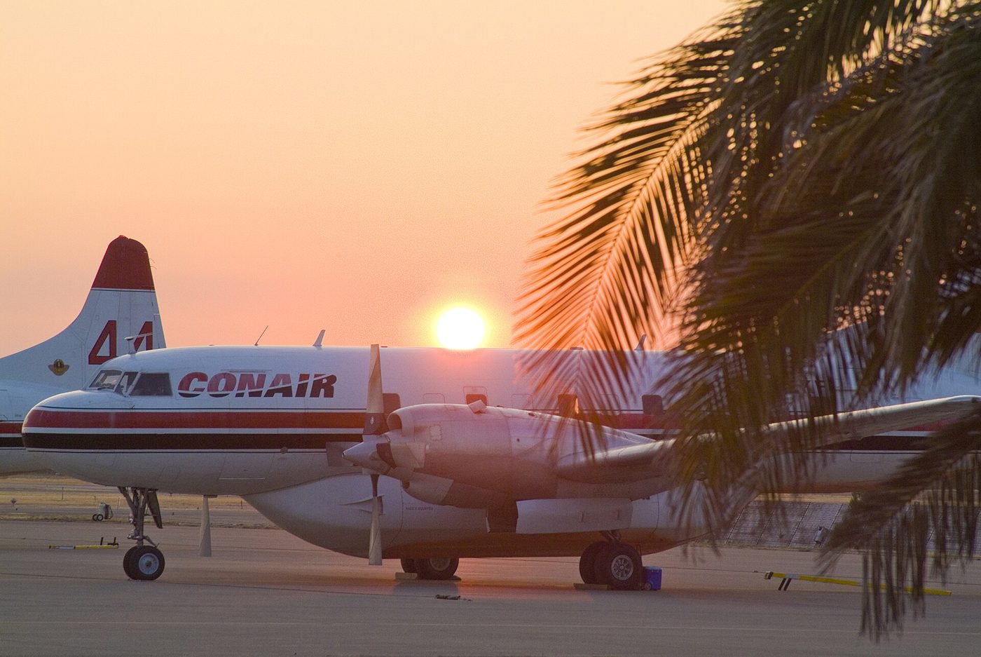 A B.C.-based Conair air tanker at sunset (file photo, California)