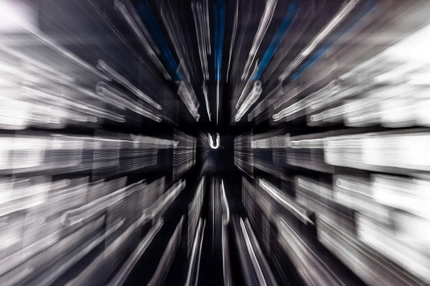 Camera zoom burst, centering on the letter "U", on a black Microsoft Wired 600 computer keyboard with Swedish language
