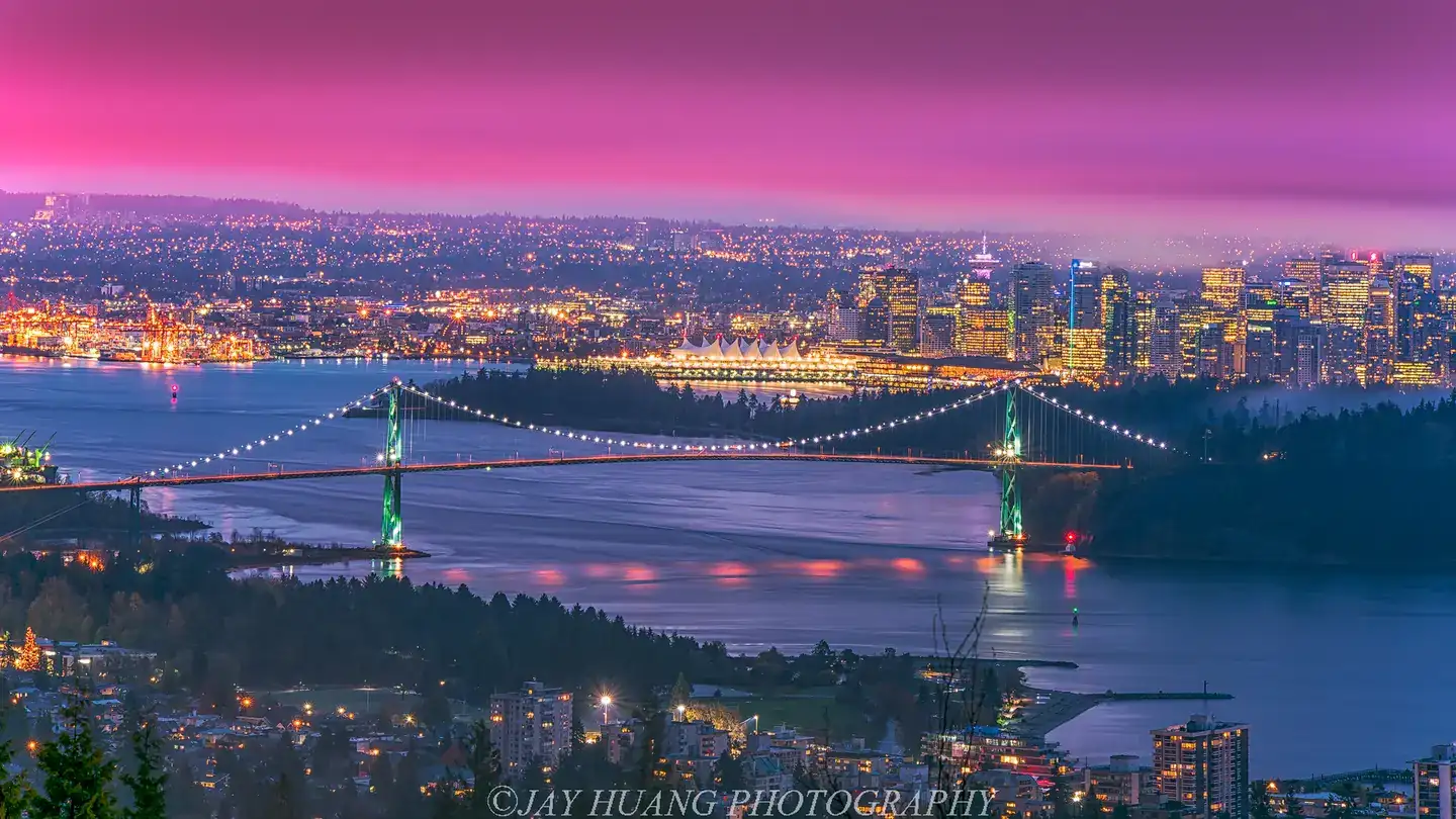 Downtown Vancouver colorful skyline from Cypress Mountain under cloudy day