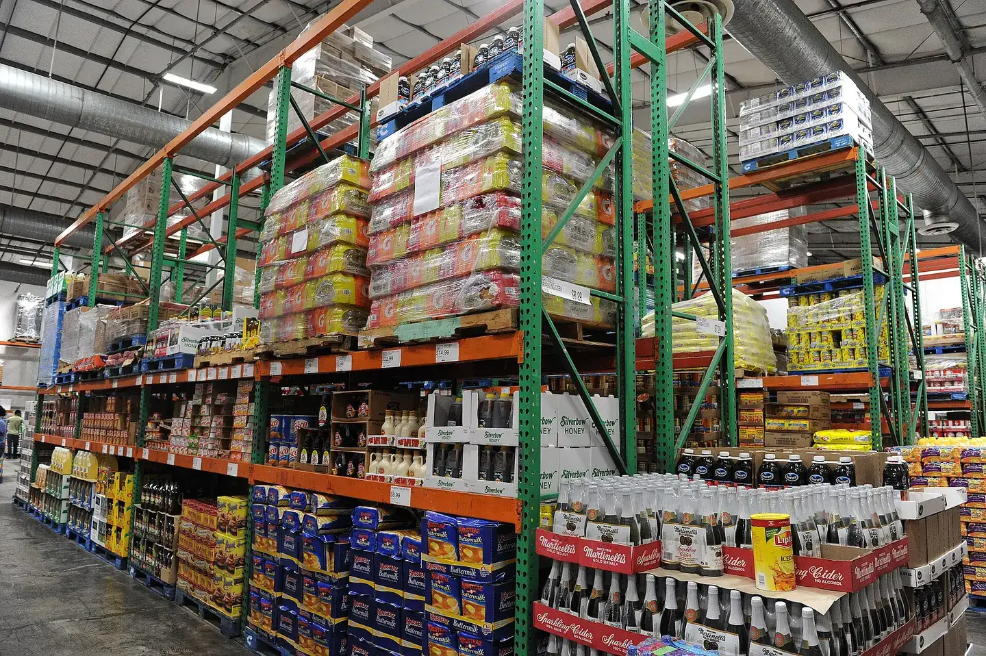 Warehouse-style store shelves stocked with goods