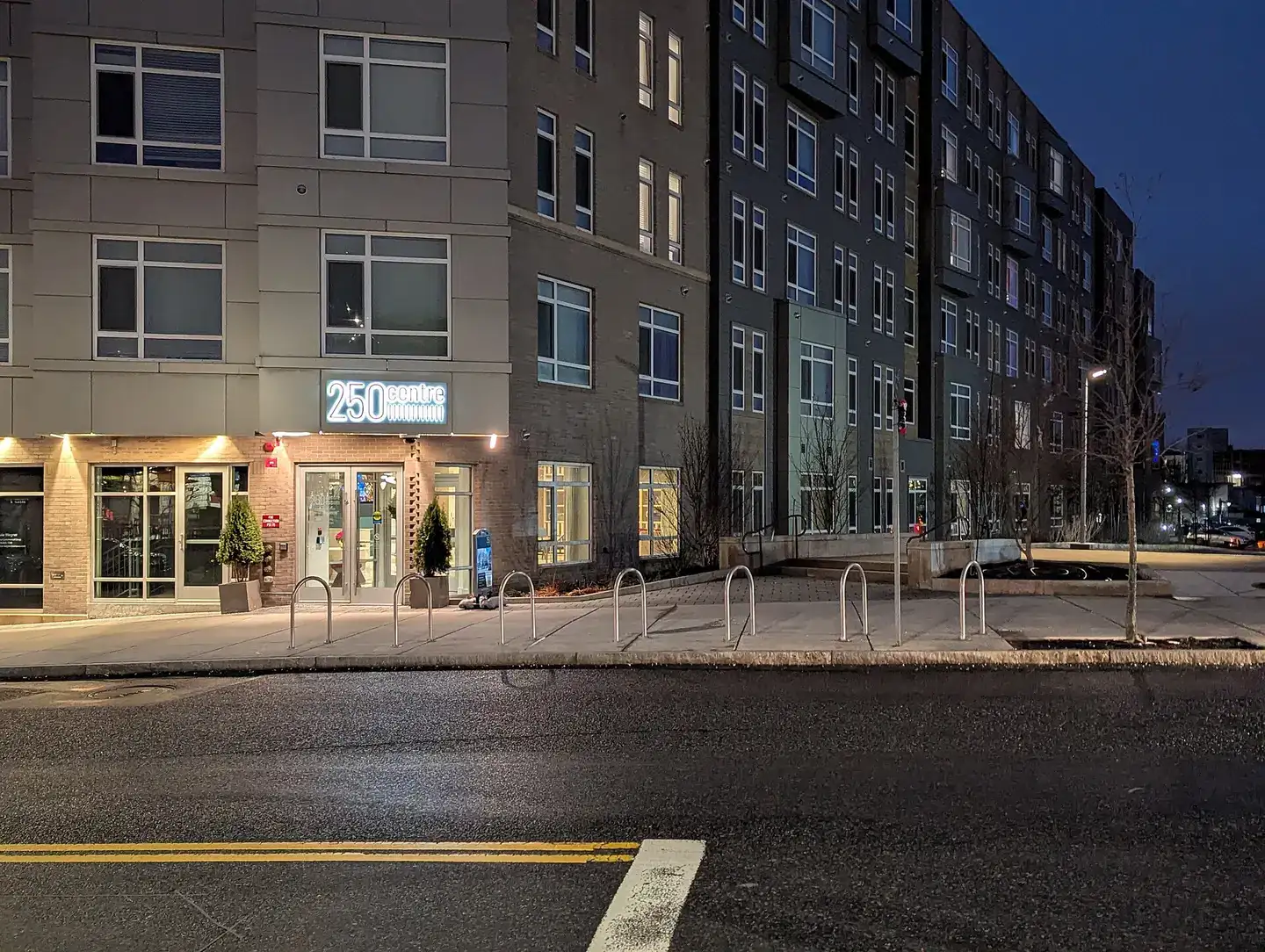 7 staple style bike racks on Centre St in Jackson Sq