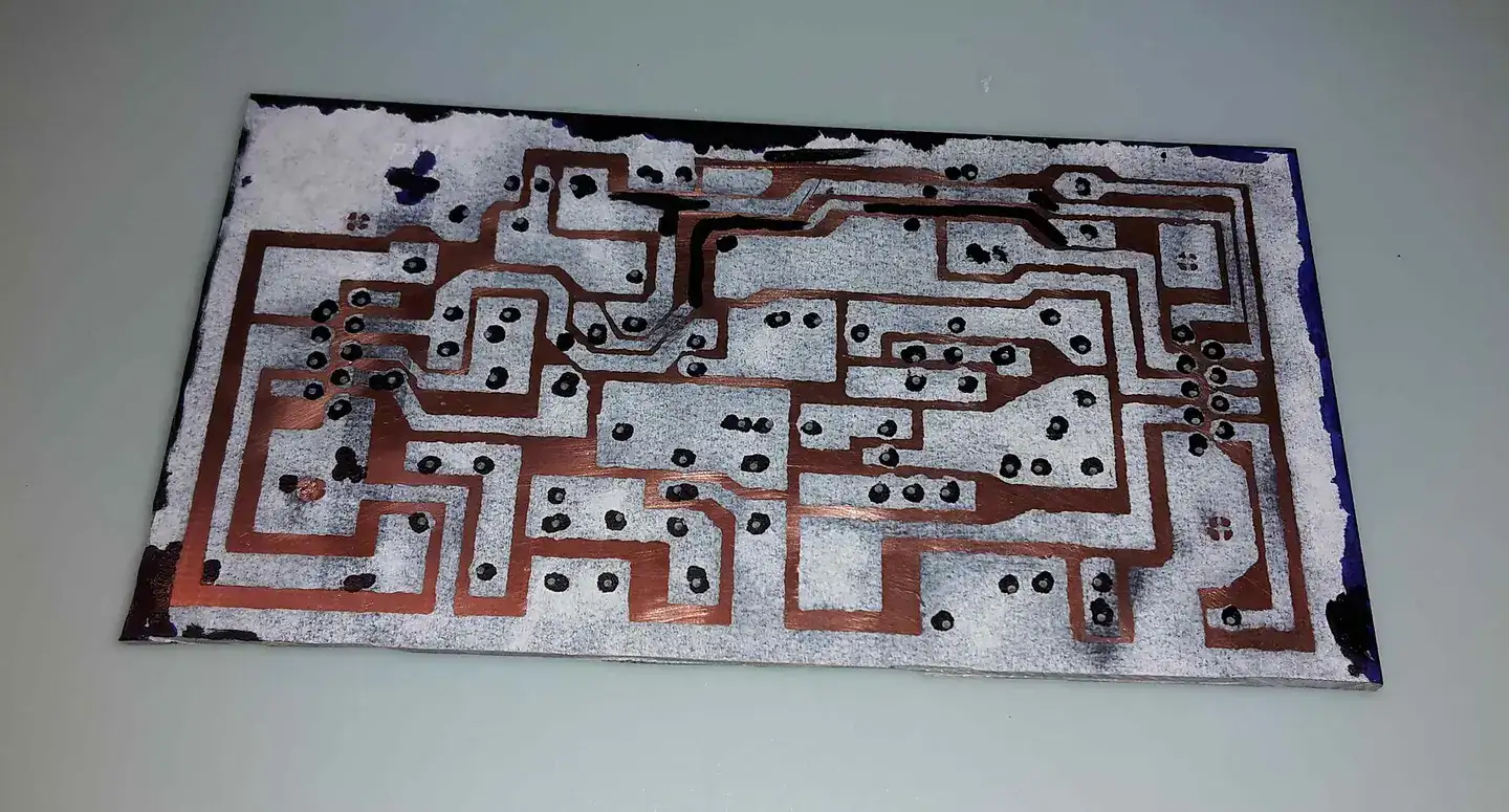 A protective layer of laser toner was put on top of the copper surface using a hot iron