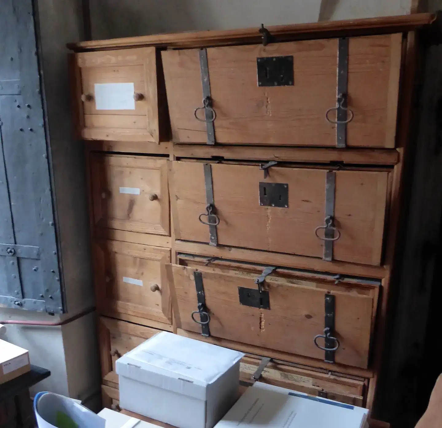 Old wooden boxes that once contained the archives of Einsiedeln Abbey