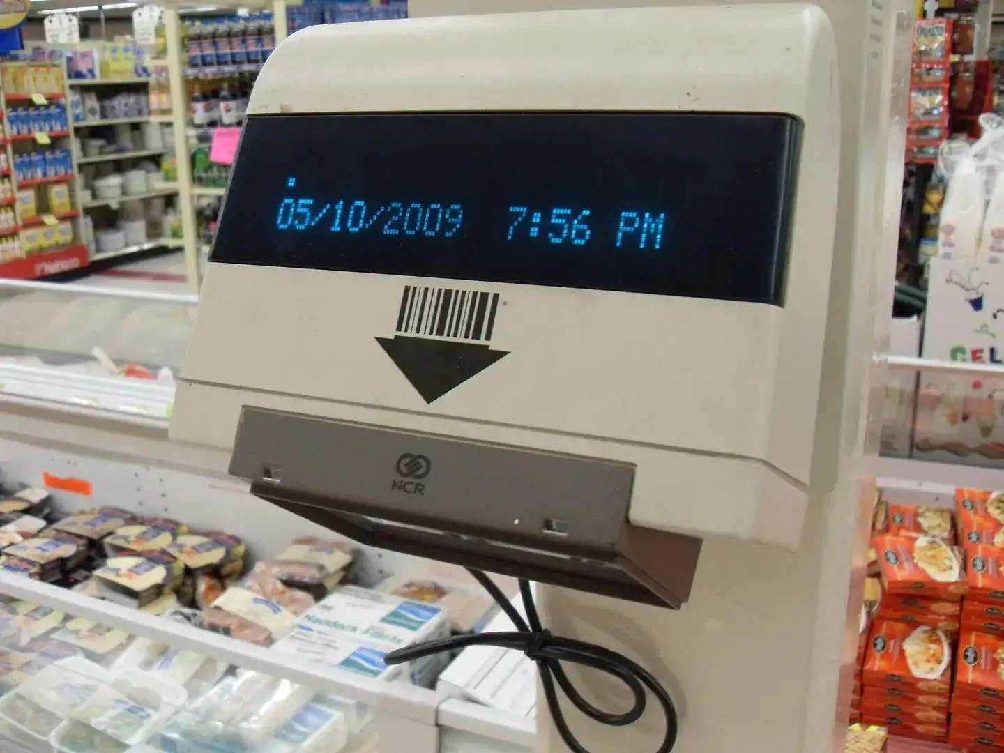 Image title: An old price scanner at a supermarket Image from Public domain images website