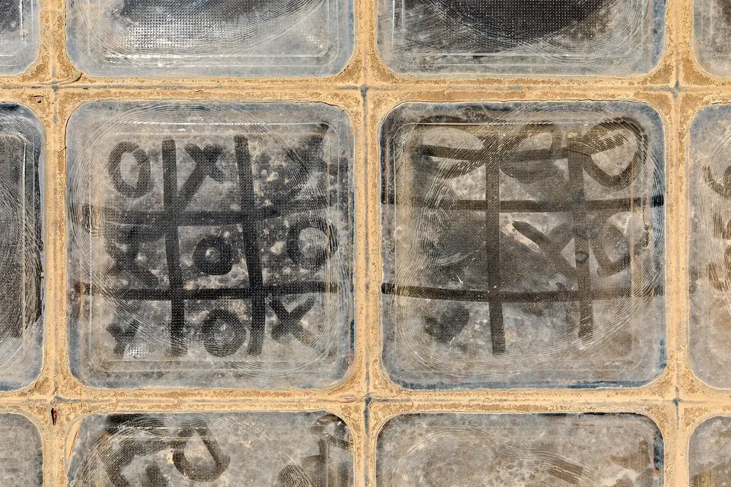 Tic-tac-toe game on glass blocks in the Fortezza, Rethymno, Crete, Greece